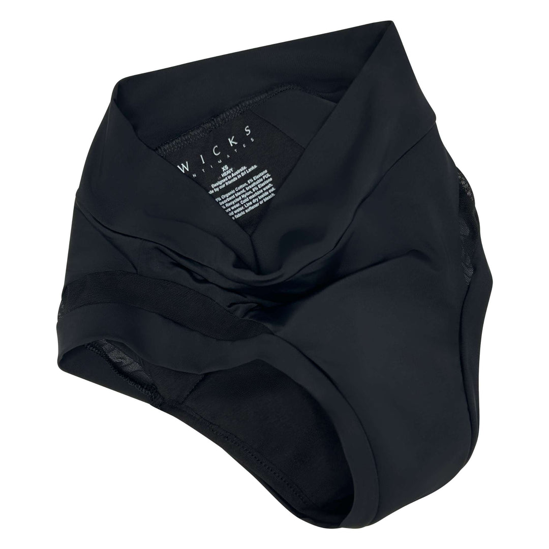  Image of high-waisted Valley brief in obsidian black with mesh panel detailing over the side of the garment artfully strewn. For bladder leaks and heavy periods that require higher absorption. Absorbs 30mL. OEKO-TEX certified butter-soft blend fabric.