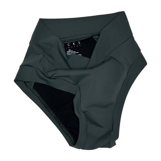 Flat lay clear cut image of the Anything But Basic brief in forest. Product is artfully strewn.  For everyday wear with one absorbent layer but no waterproof layer. OEKO-TEX certified butter-soft blend fabric.
