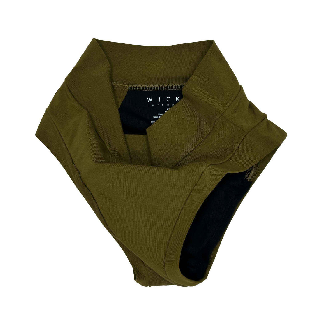 Flat lay image of high-waisted, organic cotton basic brief. Artfully scrunched. Absorbs 30mL.