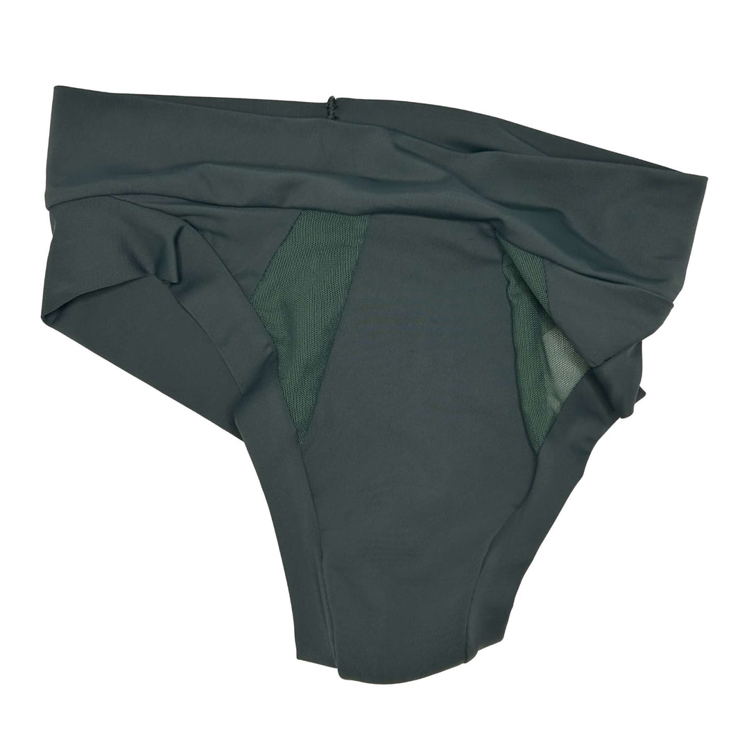 Flat lay clear cut image of Striation thong in forest. Product is artfully strewn. From All Day Fresh range, for everyday wear: one absorbing layer, no waterproof layer. Low rise style with mesh panel detailing at the front. Made from OEKO-TEX certified butter-soft blend fabric.