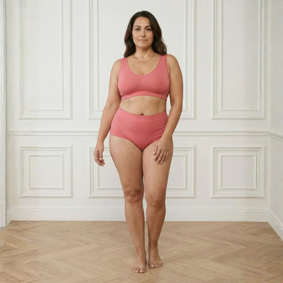 Full length image of woman wearing Wicks Intimates Anything But Basic Brief II in Dusky Rose for everyday wear.