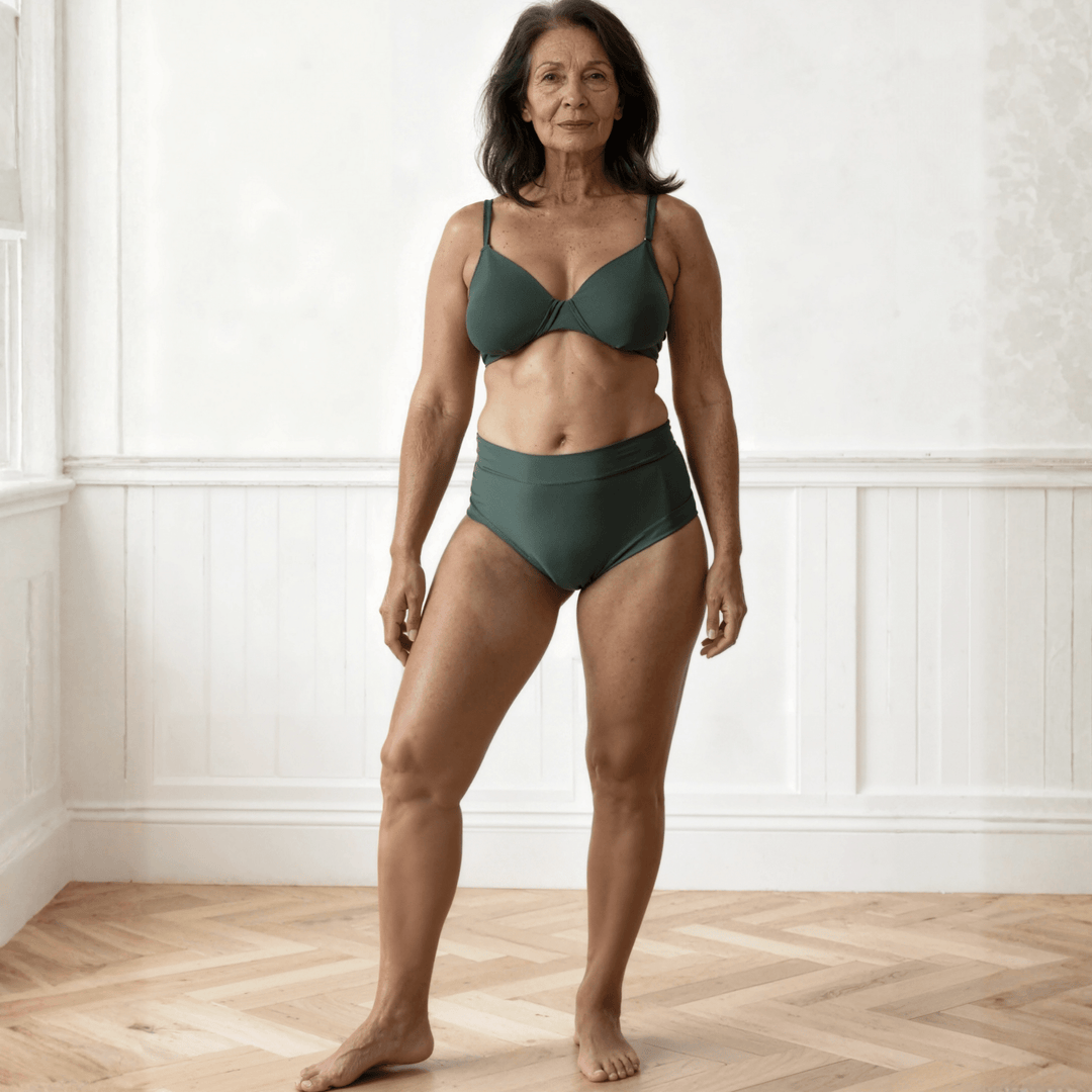 Woman in her 70s is facing the viewer wearing the Anything But Basic brief from the Wicks Intimates All Day Fresh range in Forest green and made from OEKO TEX certified fabric