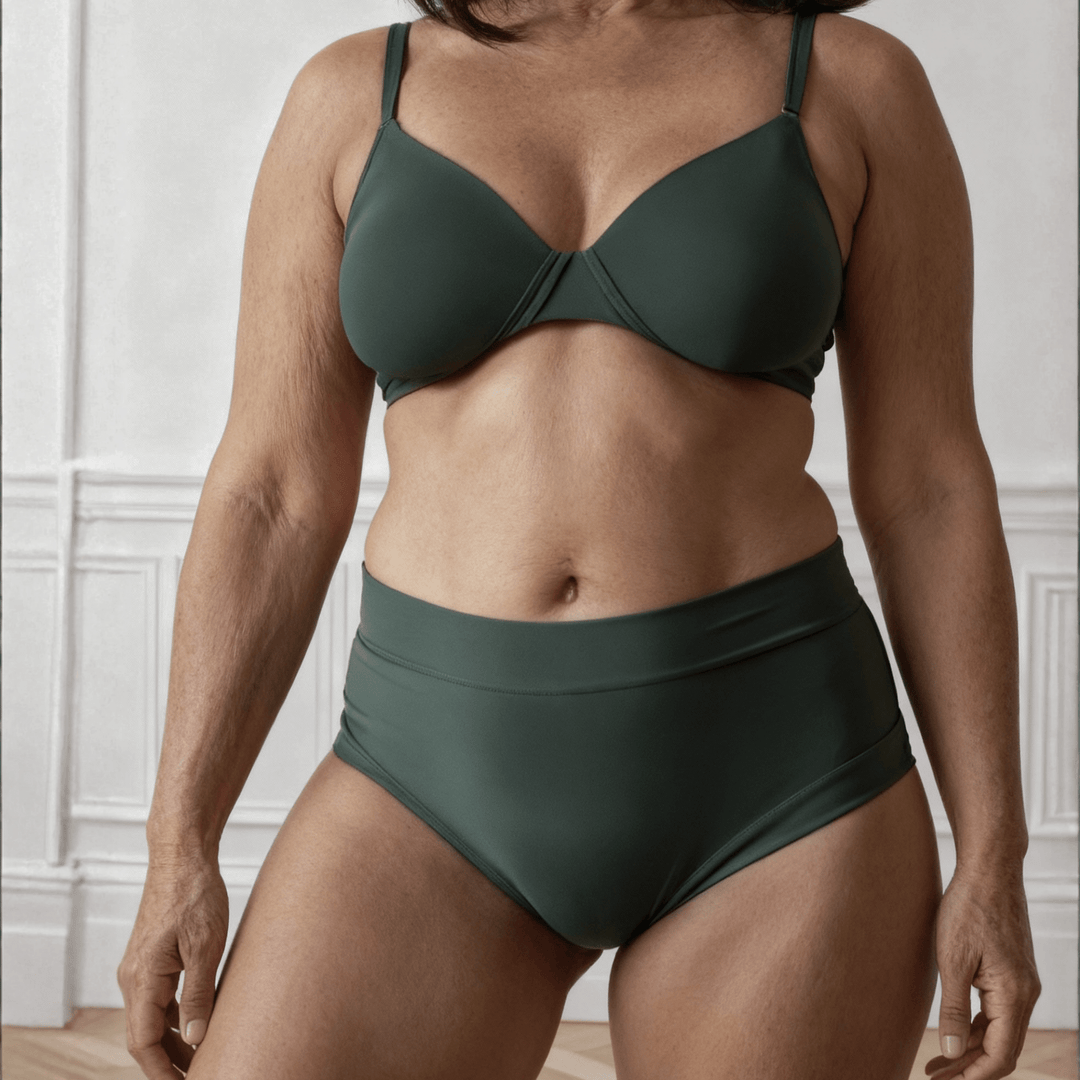 Detail of a woman in her 50s wearing the Anything But Basic brief from the Wicks Intimates All Day Fresh range in Forest green and made from OEKO TEX certified fabric