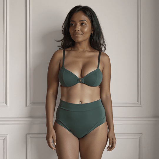 Woman in her 30s facing the viewer wearing the Anything But Basic brief in Forest green from the Wicks Intimates All Day Fresh range and made from OEKO TEX certified fabric 