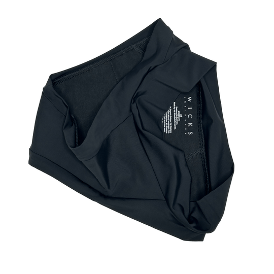 Artfully strewn flat lay image of the Elevated Essentials brief in Obsidian Black made from OEKO TEX certified fabric