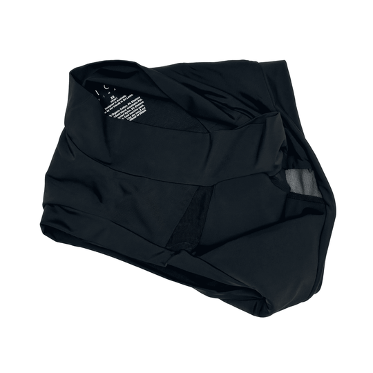 Artfully strewn flat lay image of the high-waisted Emanate brief in Obsidian black made from OEKO TEX certified fabric