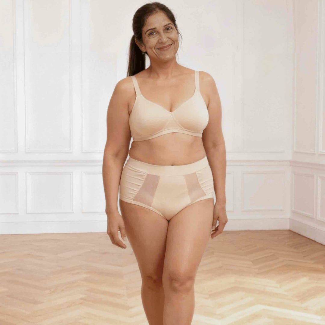 Wicks Intimates Emanate II All Day Fresh lightweight absorbent underwear in shell (nude) on model, front view