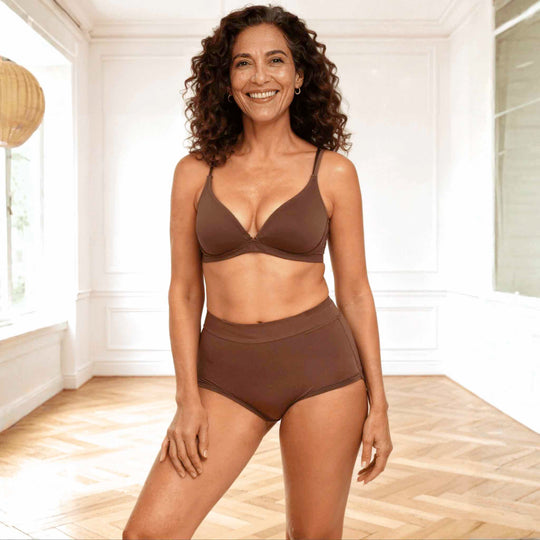 Wicks Intimates Anything But Basic Brief II 15mL absorbent underwear in dark chocolate worn on model, full body view