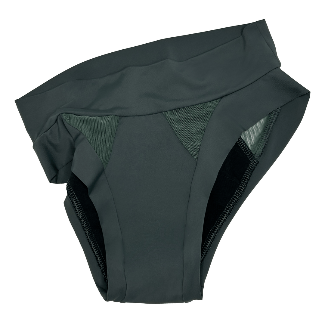 Artfully strewn flat lay image of the low-rise Swept Away brief n forest green made from OEKO TEX certified fabric