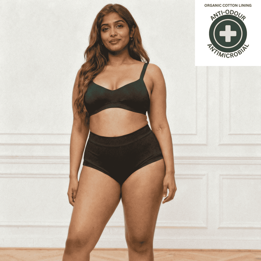 Woman wearing the Wicks Intimates Emily brief with antimicrobial and anti-odour badge top right.
